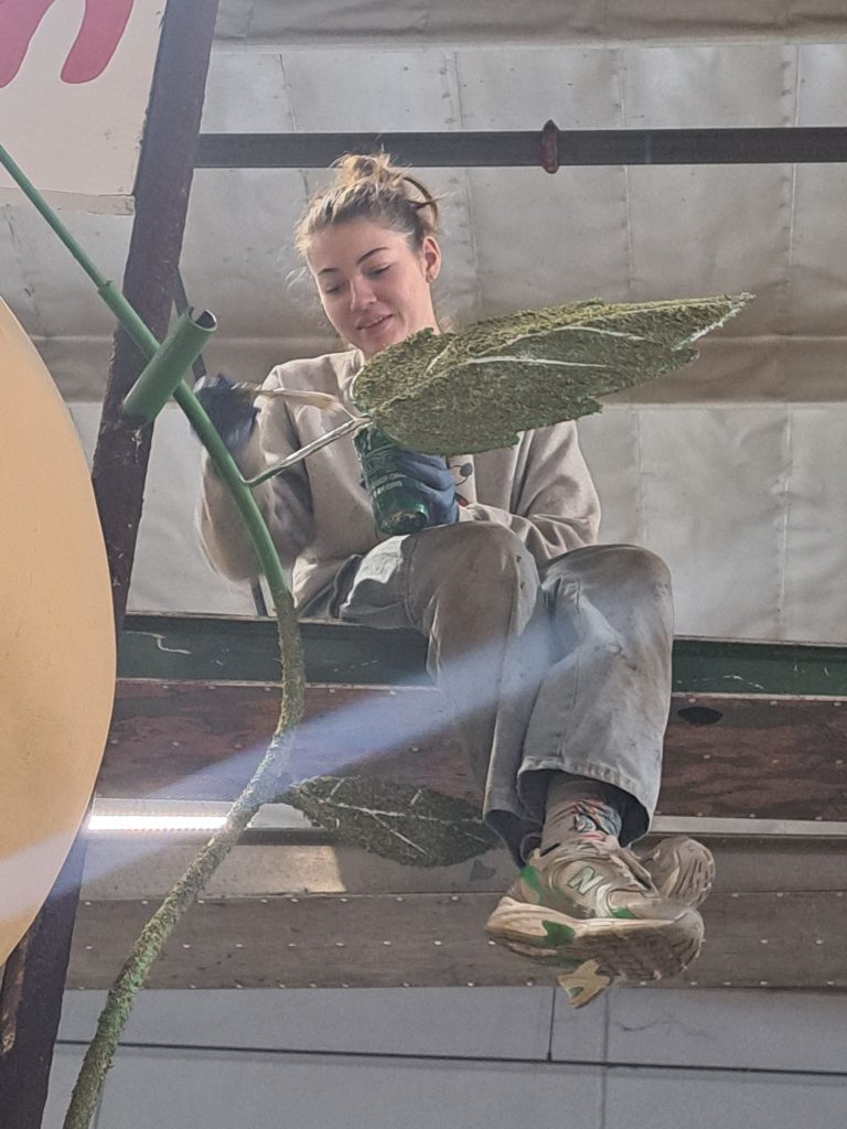December 27 - Elizabeth got to work on top today, gluing green stuff on leaves and stems.