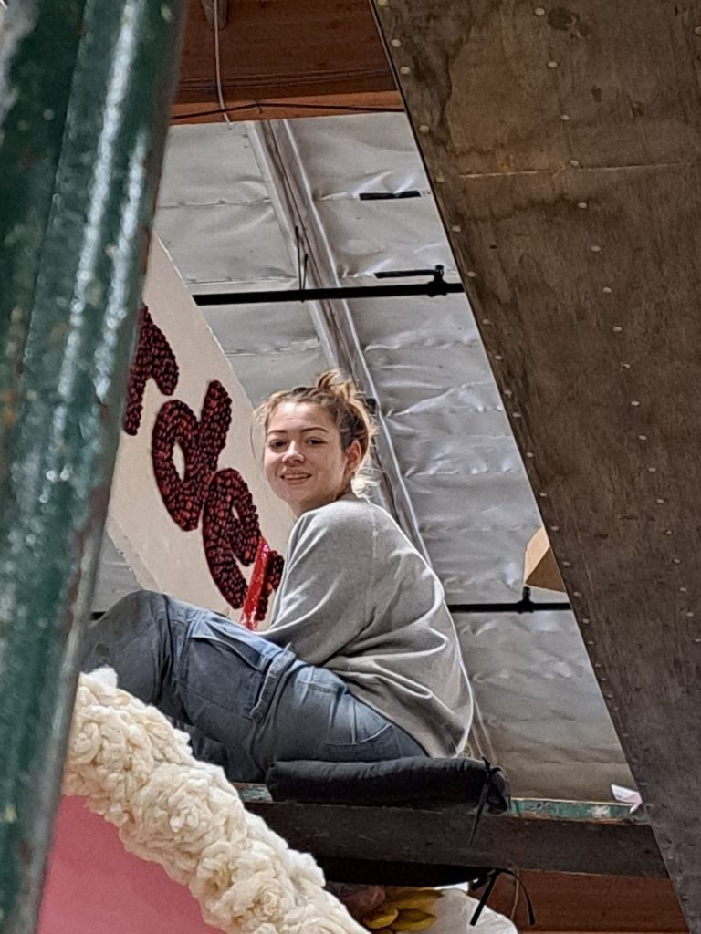 December 29 - Elizabeth is finishing the community garden sign.